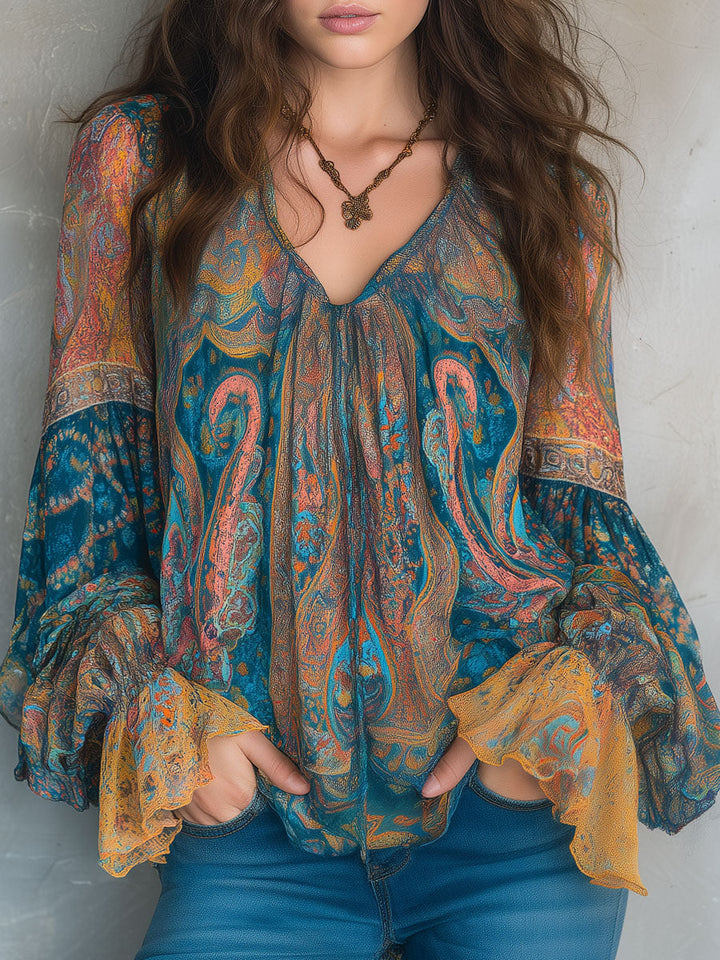 Sara™ | Blusa bohemia de gasa con estampado de cachemira en tonos teal y ámbar con puños con volantes  