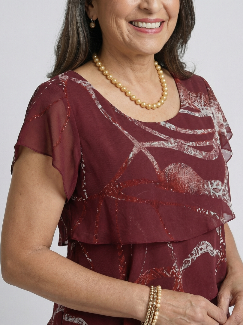 Alani | Vestido pelo joelho com padrão abstrato harmonioso