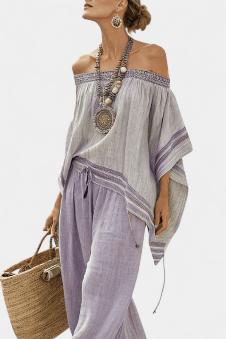 Zandrel | Top elegante con hombros descubiertos y pantalón de rayas de pierna ancha