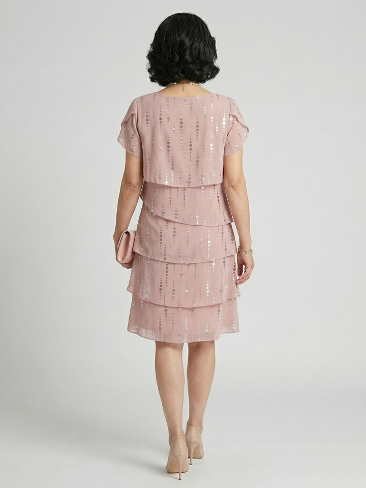 Makena | Vestido hasta la rodilla con diseño de puntos y líneas elegante