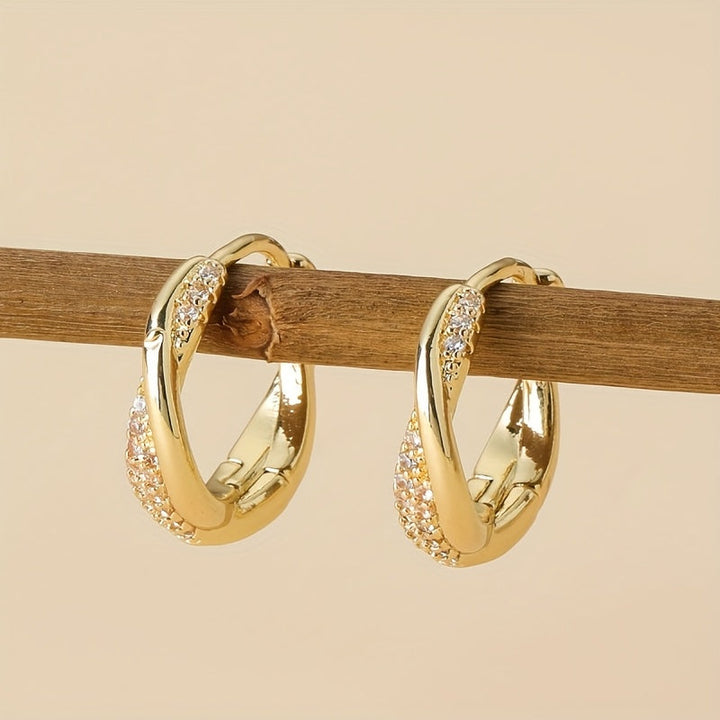 Twisted Gold Hoop Earrings with Pavé Crystal Accents