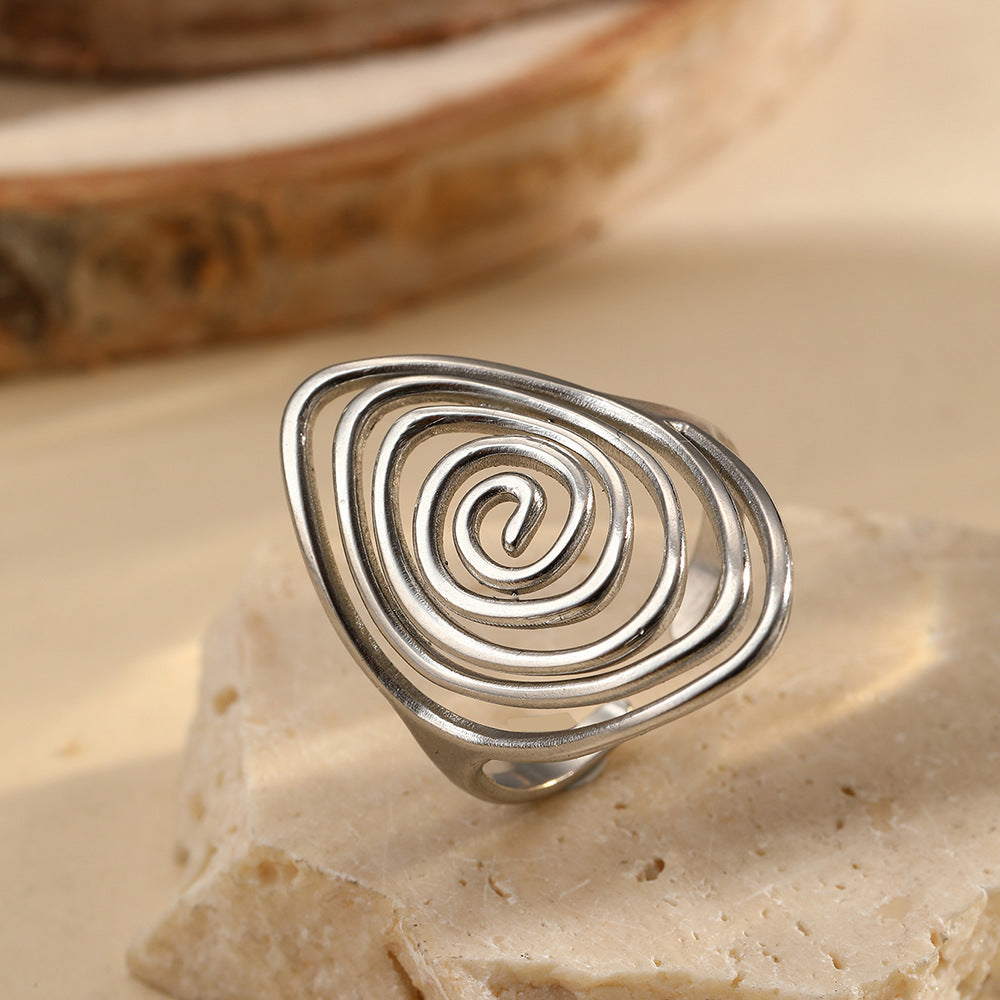 Anillo llamativo dorado, escultórico y en espiral, Vortex