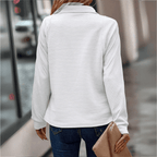 Jenica | Jersey elegante con cremallera de media longitud