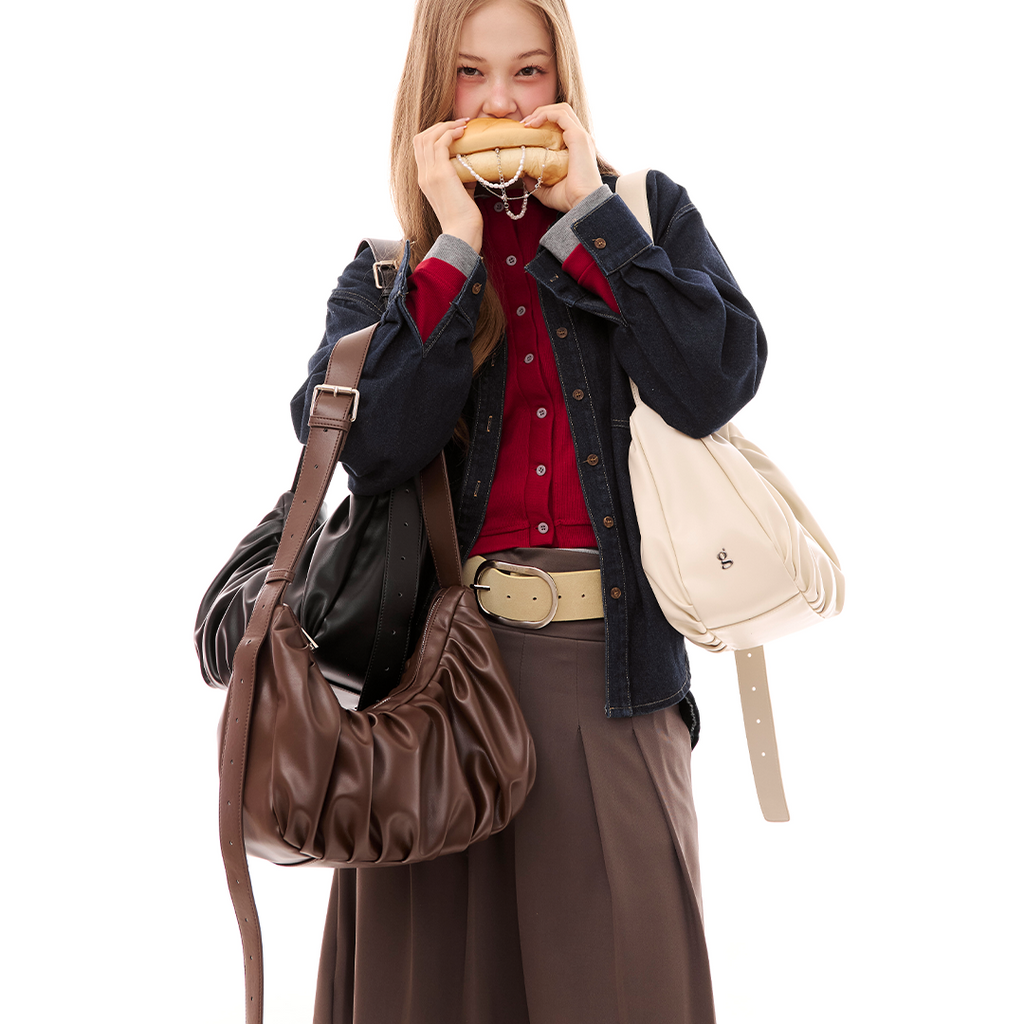 Chara | Croissant-shaped leather sling bag