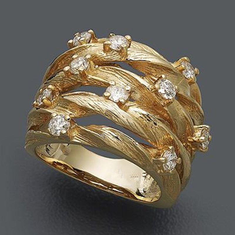 Anel elegante de banda com zircônia, estrela dourada e estilo de trepadeira sinuosa