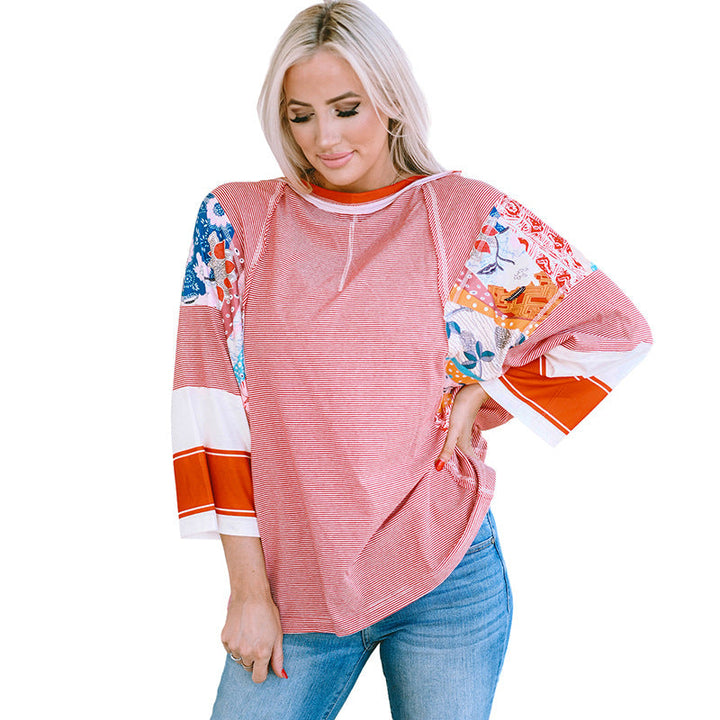 BAILEY™ – Blusa Leve Patchwork com Mangas Morcego