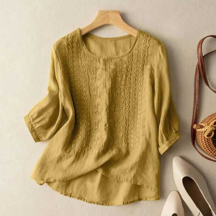 Aurora – Blusa relajada bordada