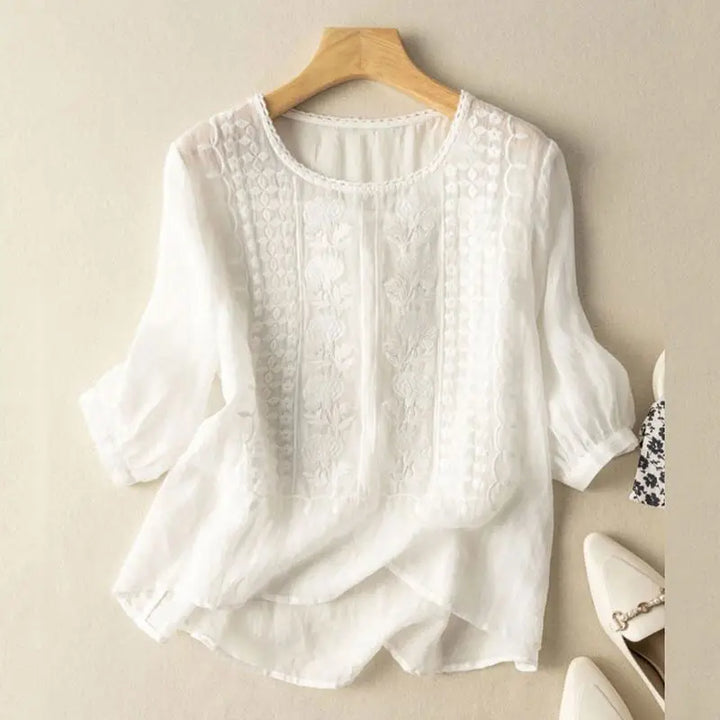Aurora – Blusa relajada bordada