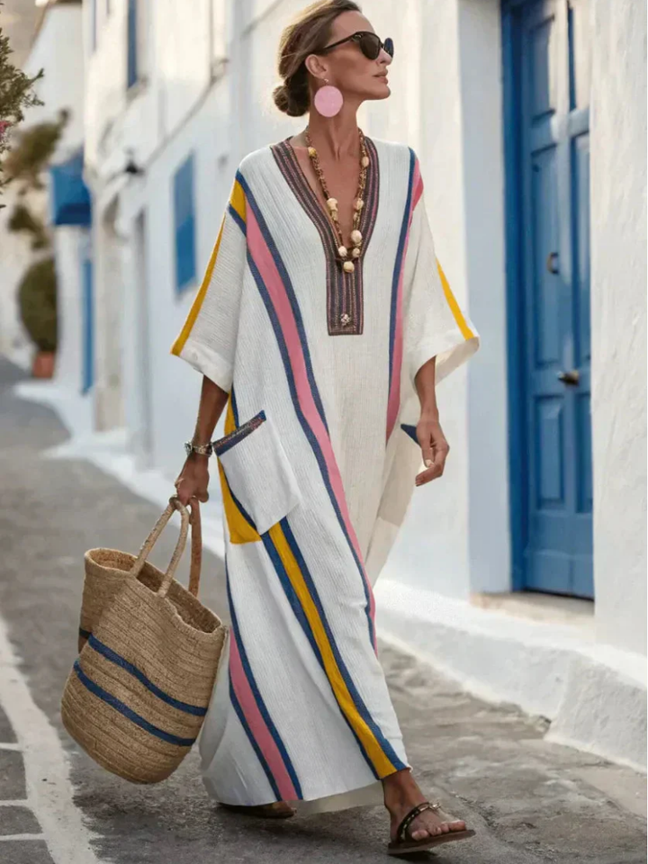 Noemi | Vestido maxi con escote en V, manga tres cuartos y bolsillos