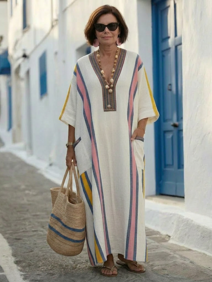 Noemi | Vestido maxi con escote en V, manga tres cuartos y bolsillos