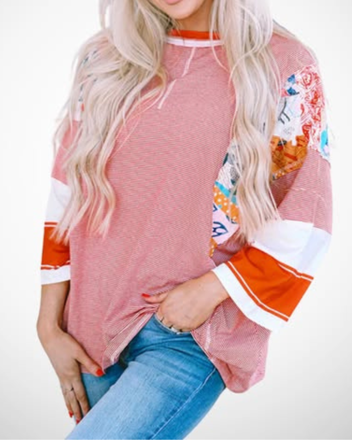 BAILEY™ – Blusa Leve Patchwork com Mangas Morcego