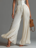 Fato-macaco Zsófia – chiffon branco plissado