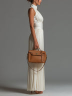 Fato-macaco Zsófia – chiffon branco plissado