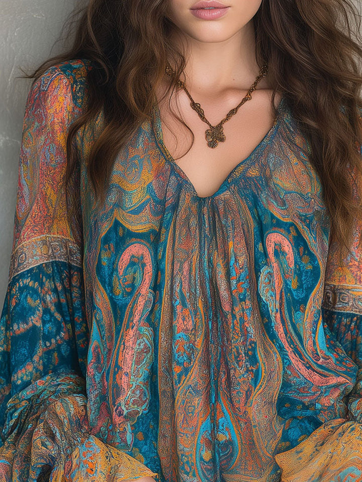 Sara™ | Blusa bohemia de gasa con estampado de cachemira en tonos teal y ámbar con puños con volantes  