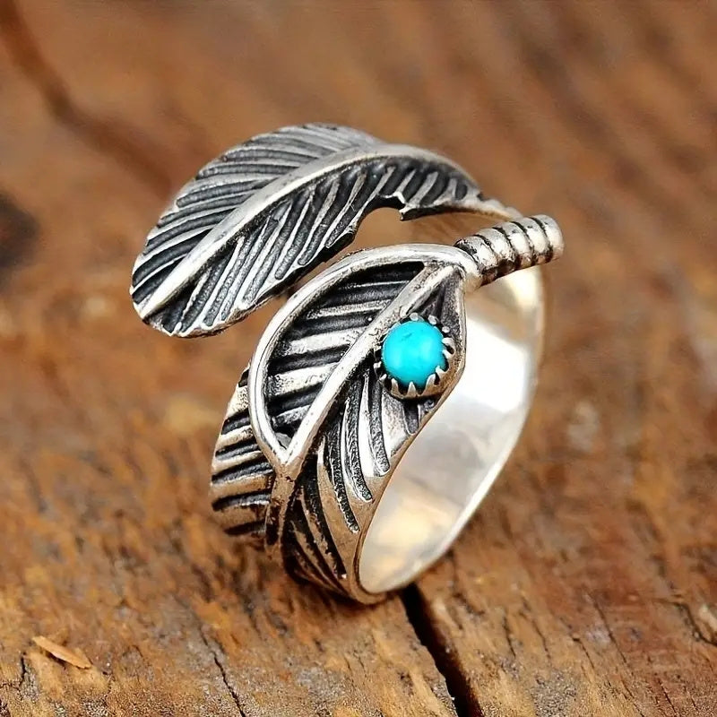 Anel boho de prata de lei com pena e turquesa