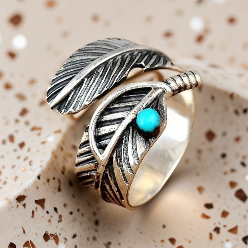 Anel boho de prata de lei com pena e turquesa