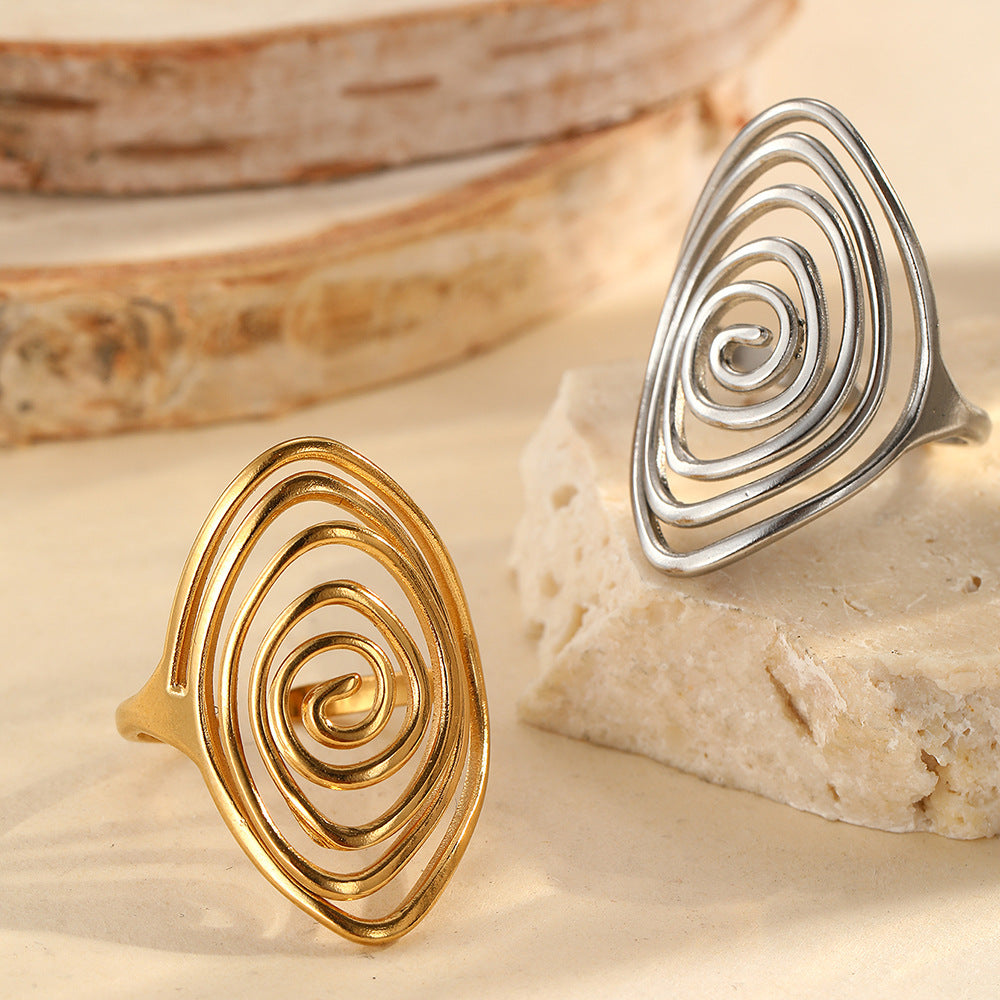 Anillo llamativo dorado, escultórico y en espiral, Vortex