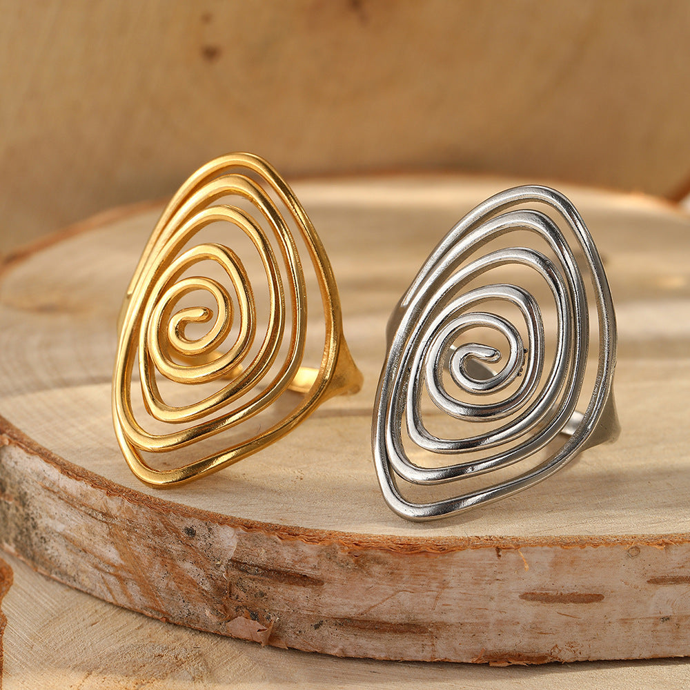 Anillo llamativo dorado, escultórico y en espiral, Vortex