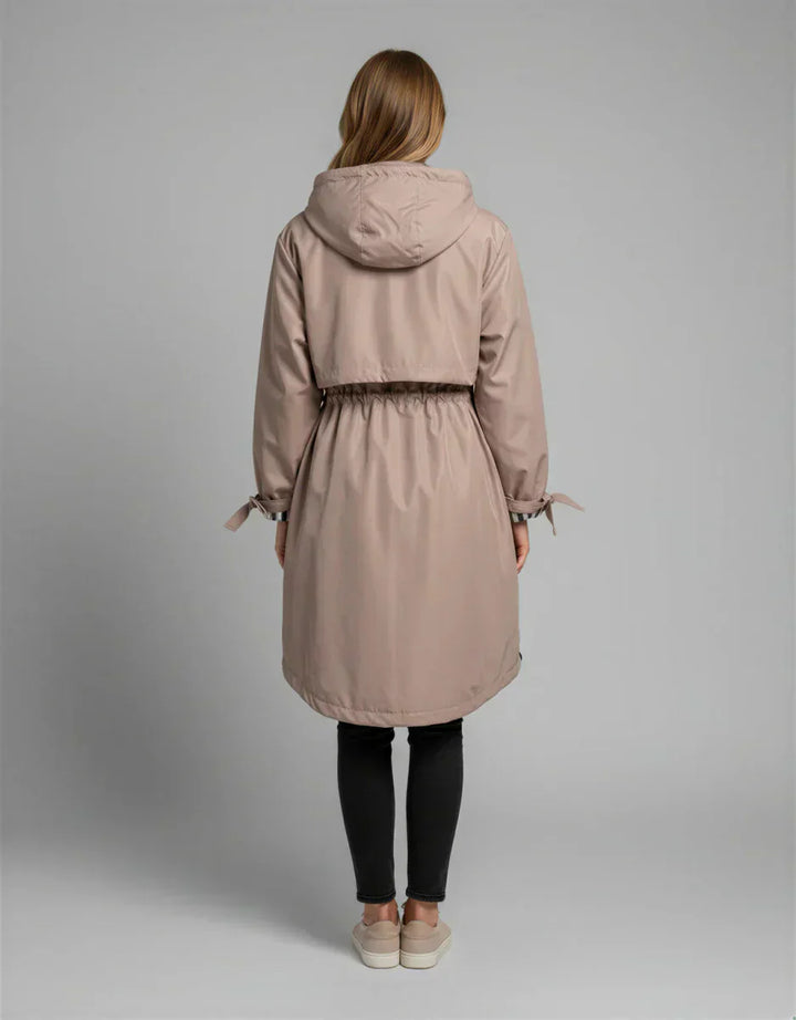 Orla | Abrigo impermeable y cortaviento