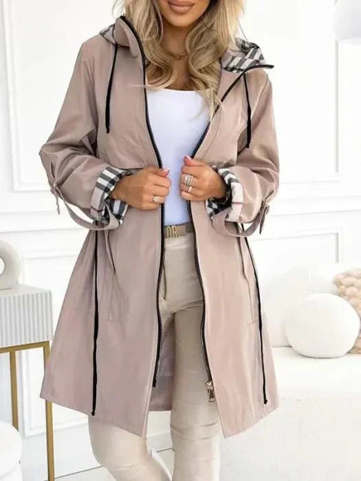Orla | Abrigo impermeable y cortaviento
