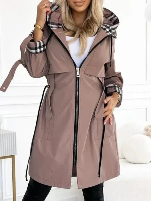Orla | Abrigo impermeable y cortaviento